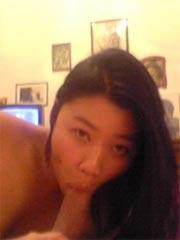 Hot asian girlfriend posing in miniskirt then sucks a hard cock