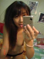 Selfmade sexy photos of cute Asian teen posing nude at home