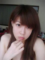 Selfmade photos of busty Asian babe at home